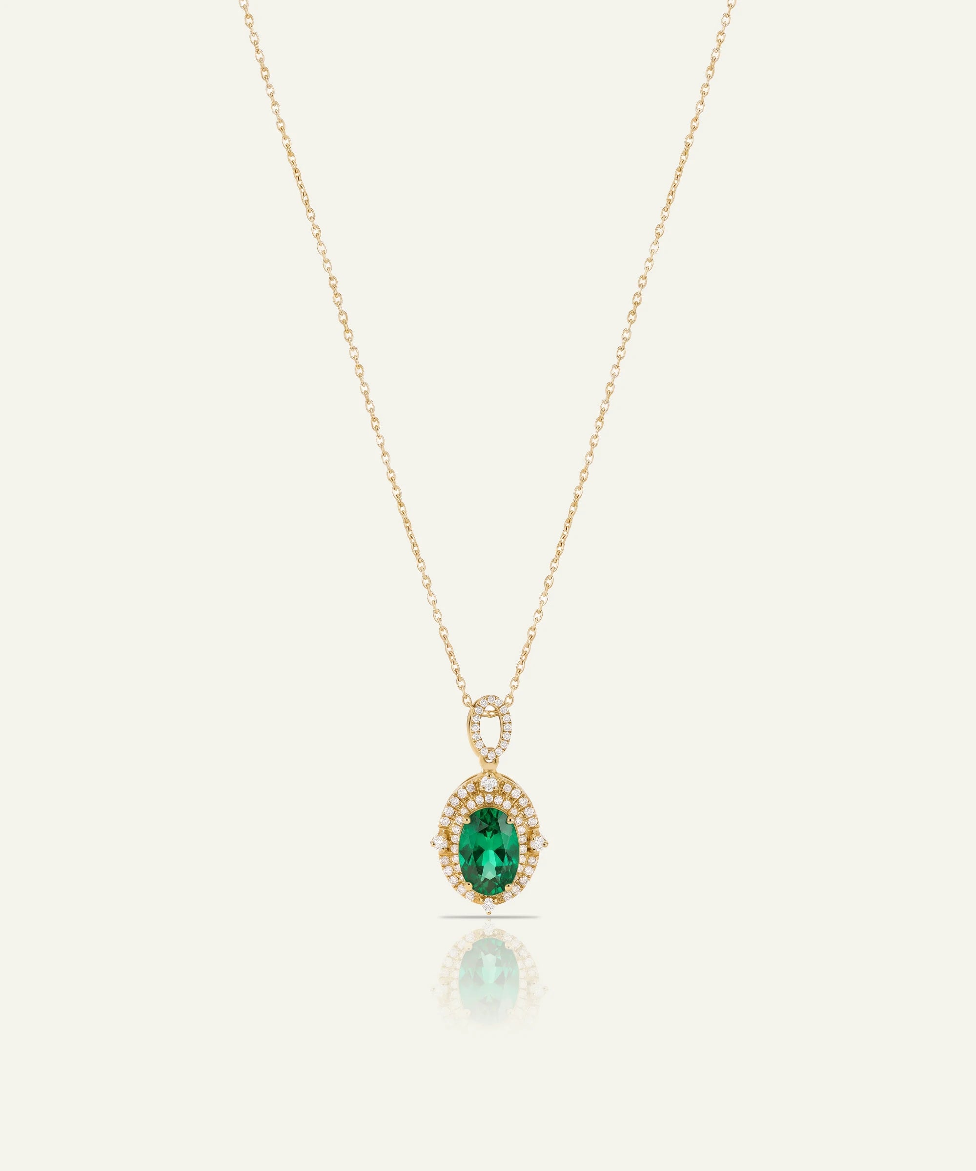 Aanika V. Emerald & Diamond Oval Double Halo Pendant - 1.00 Ct. T.W.