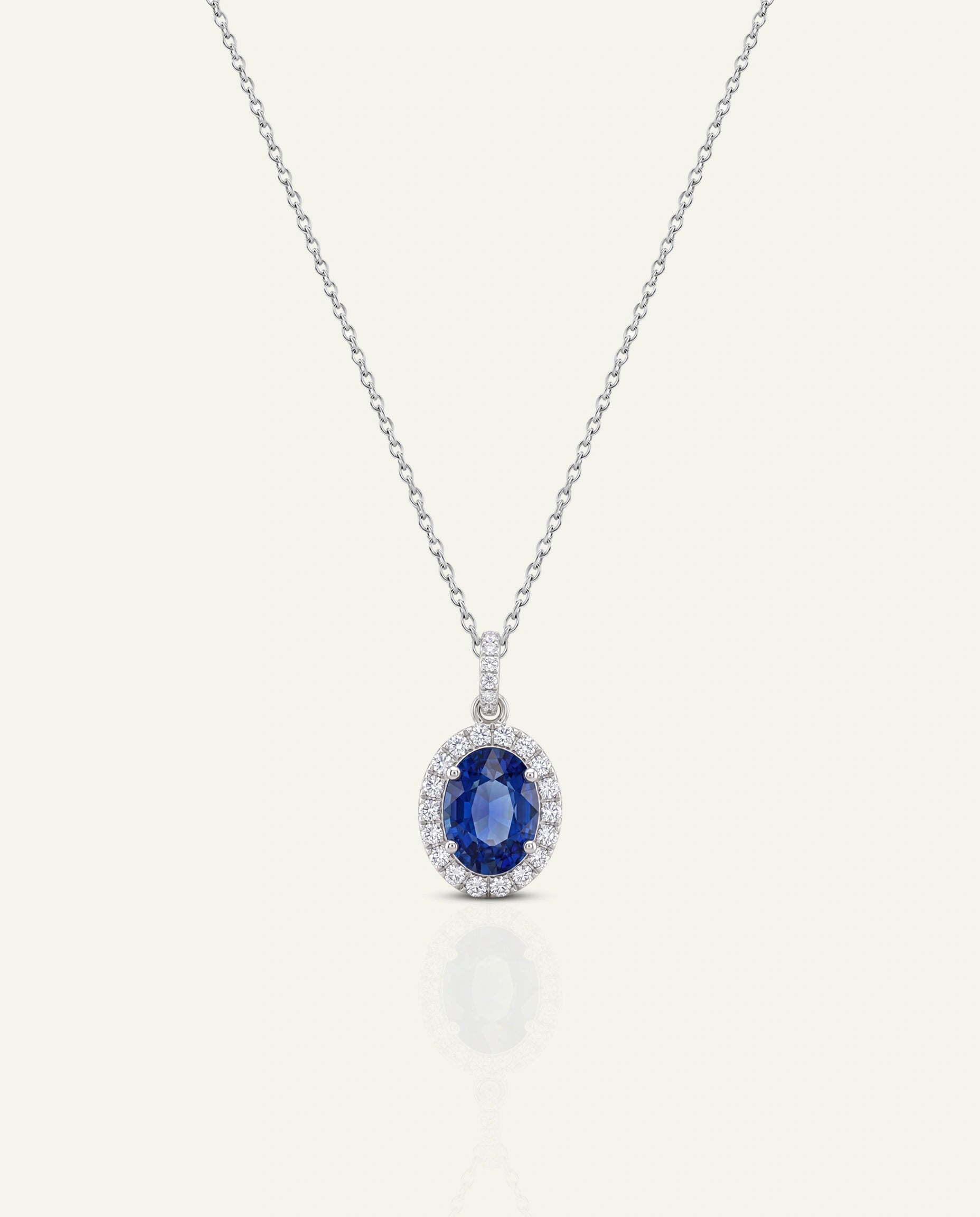 Aanika V. Oval Sapphire & Diamond Halo Pendant